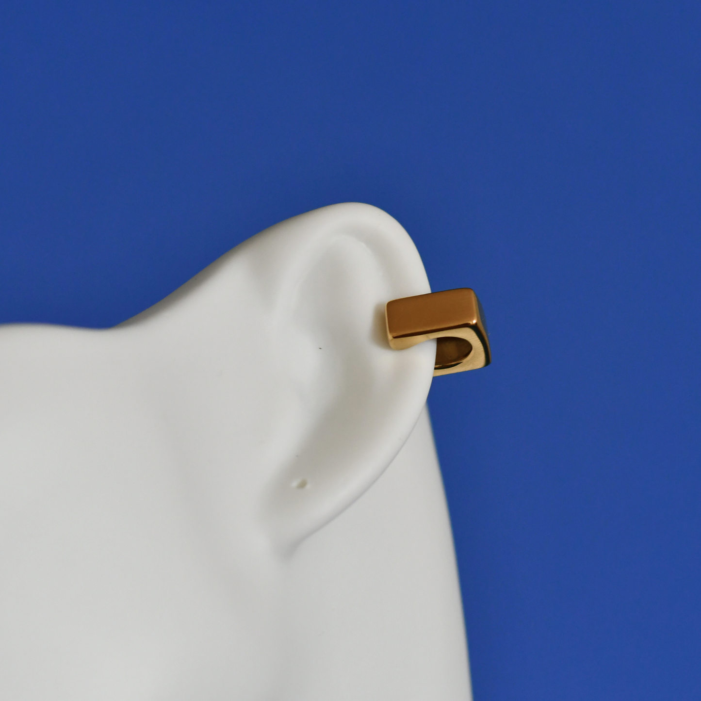 TESIR stainless steel ear cuffs in gold on ear - Alogan