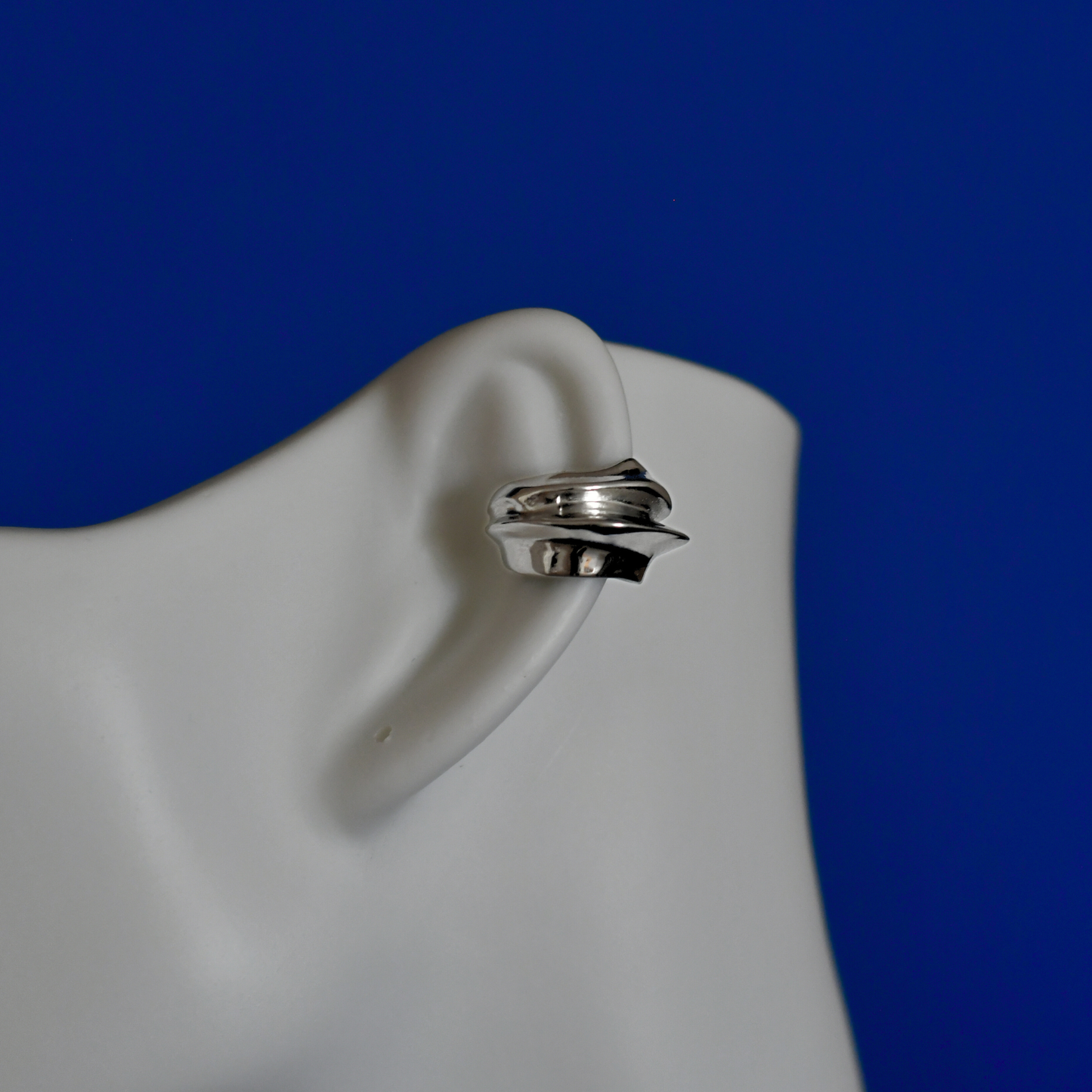 LAMES stainless steel ear cuffs in silver on ear - ALOGAN