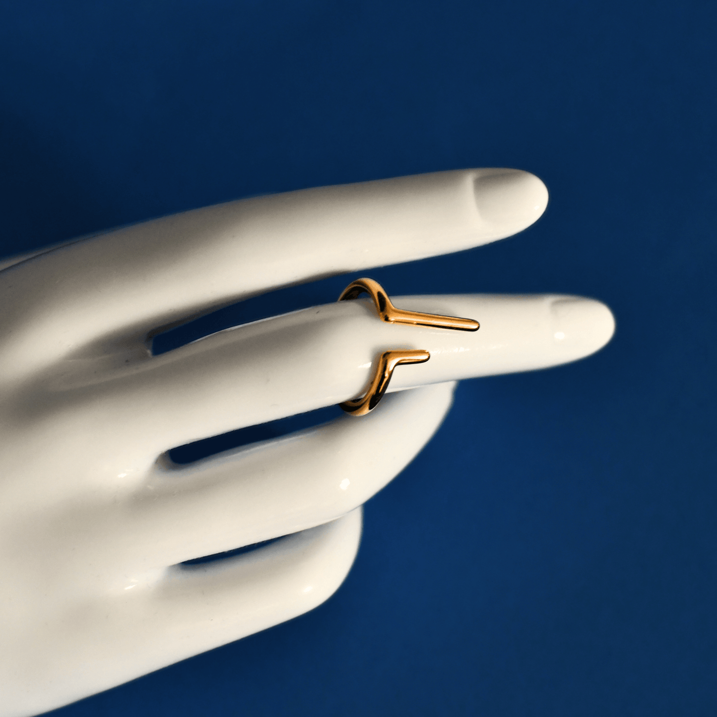 SOLY fashion designed stainless steel ring in gold on finger - Alogan